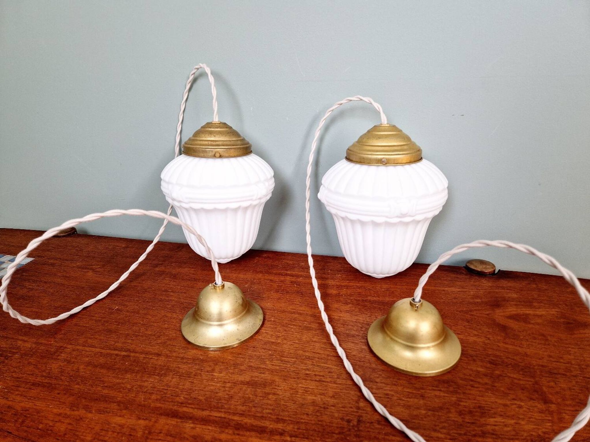 Pair of Art Deco pendant lights in pressed white opaline glass, 1920-30