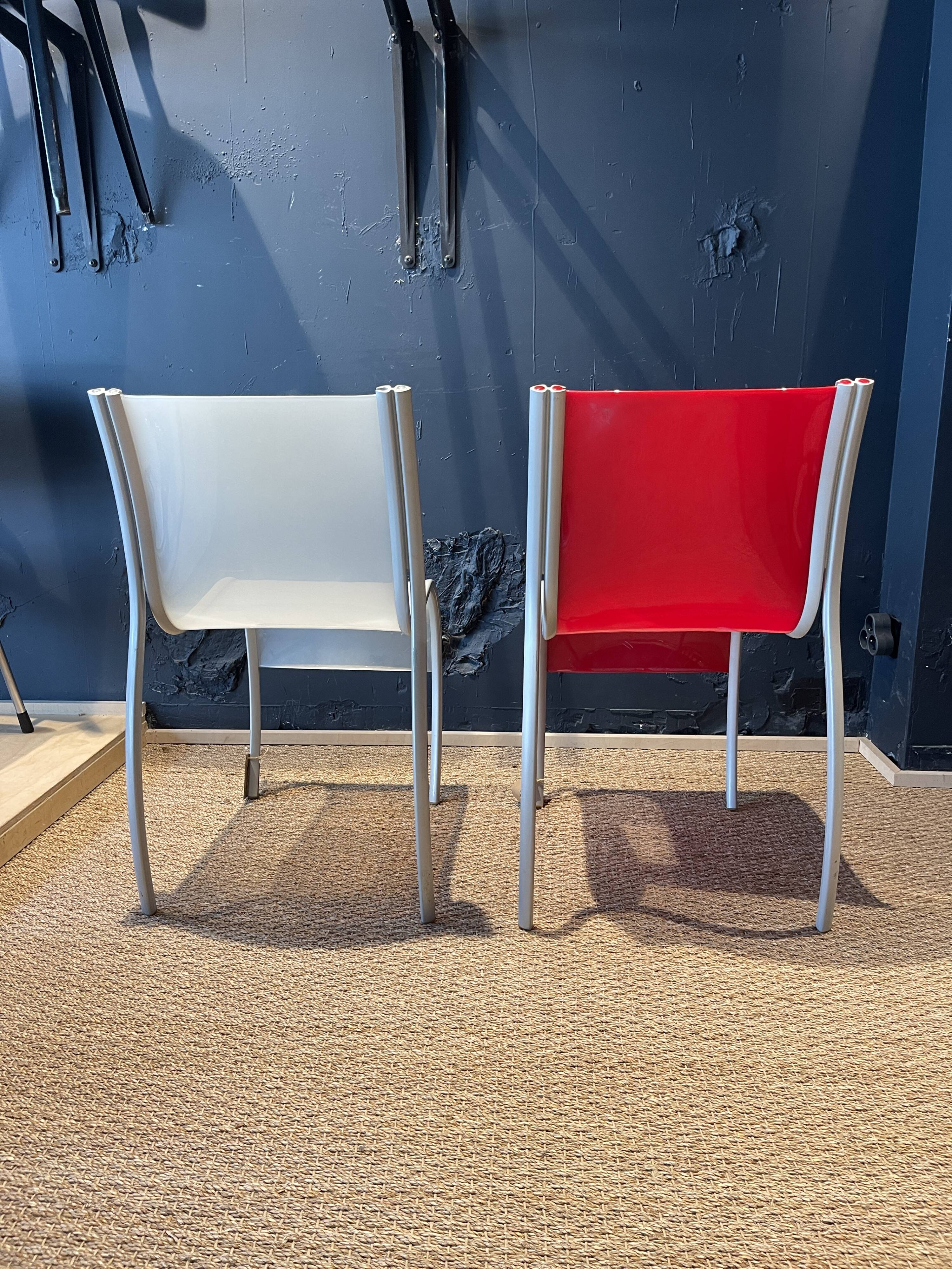 Pair of FPE chairs by Ron Arad for Kartell translucent and red Italy