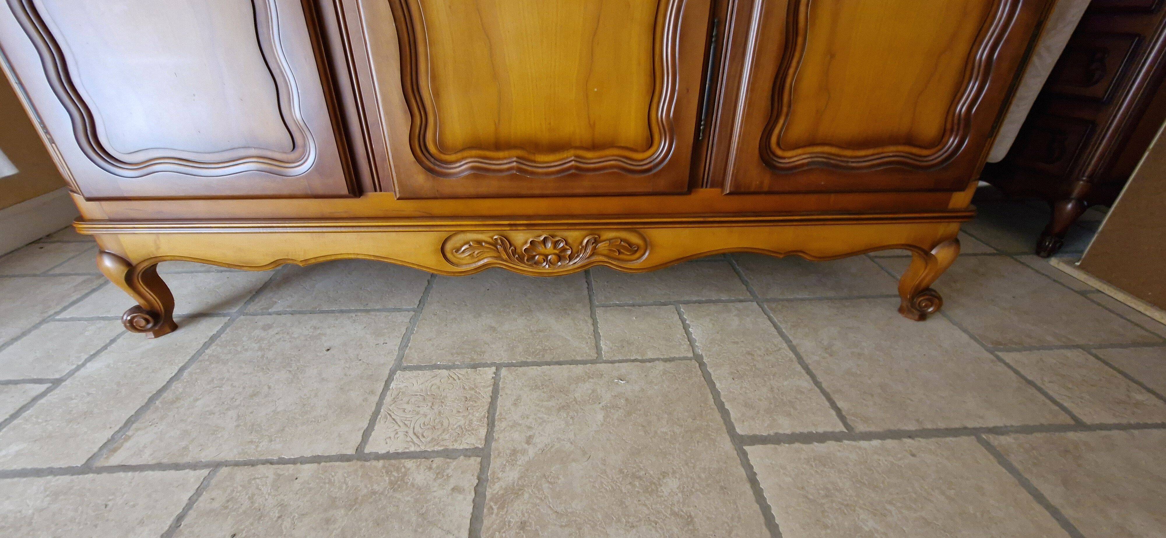 Wooden style wardrobe, 3 doors and 9 internal shelves.