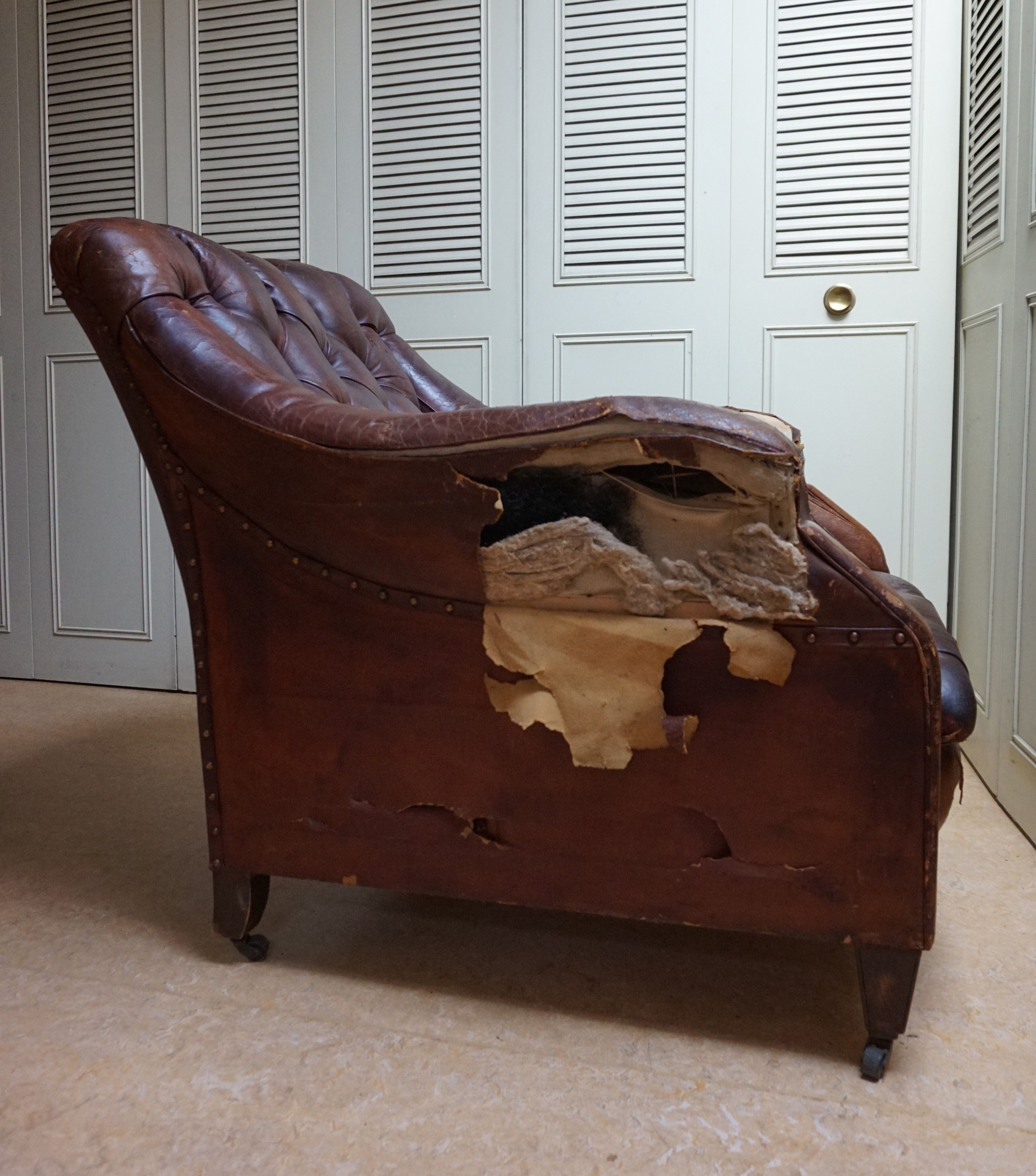 Worn Leather Buttoned Library Fireside Armchair, 1840's