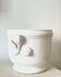 White ceramic plant pot