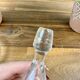 Glass carafe with enamel floral decoration and stopper – vintage