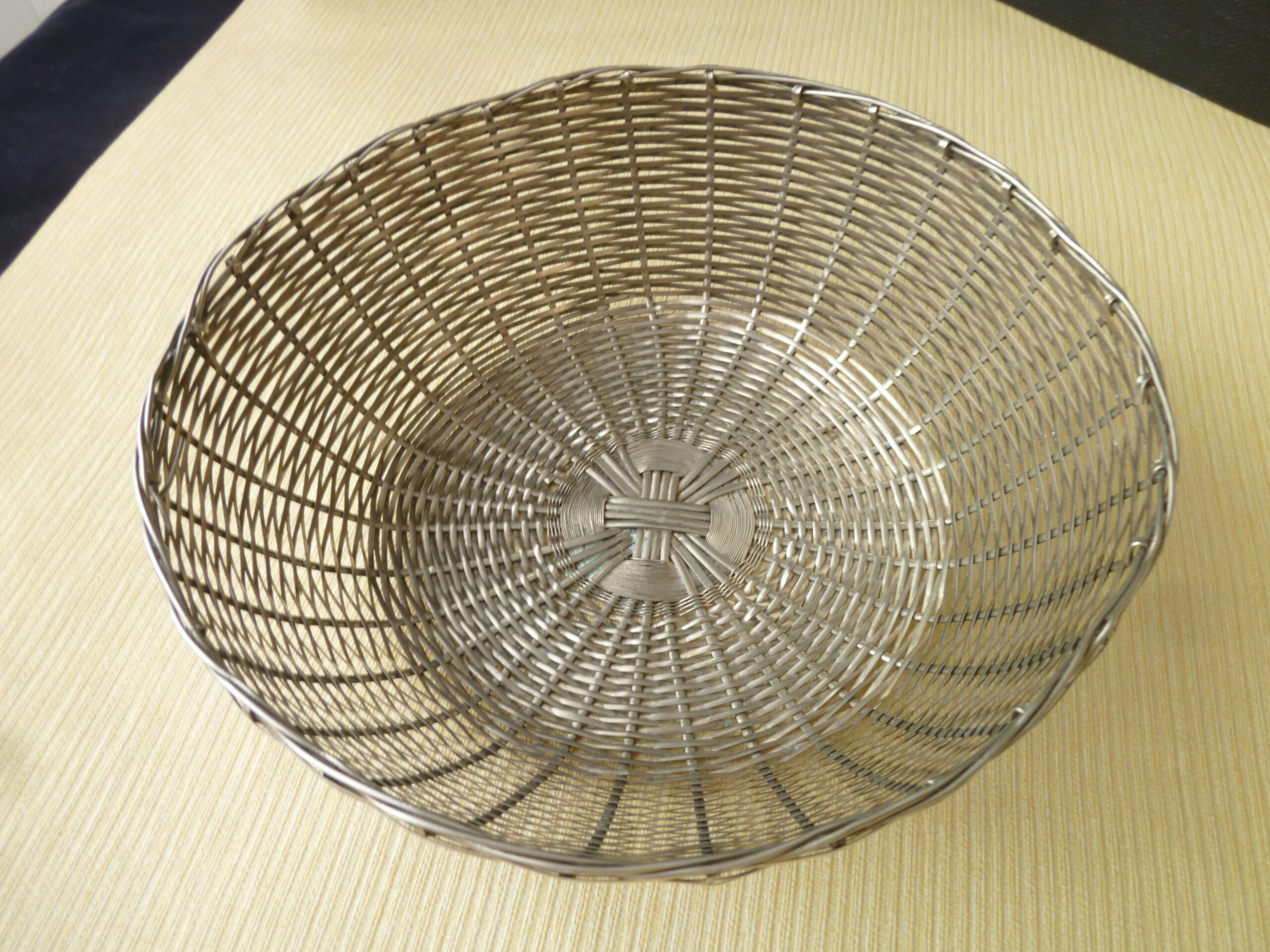 Weaving silver metal wire basket or basket
