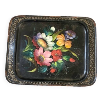 Old metal tray with flower pattern