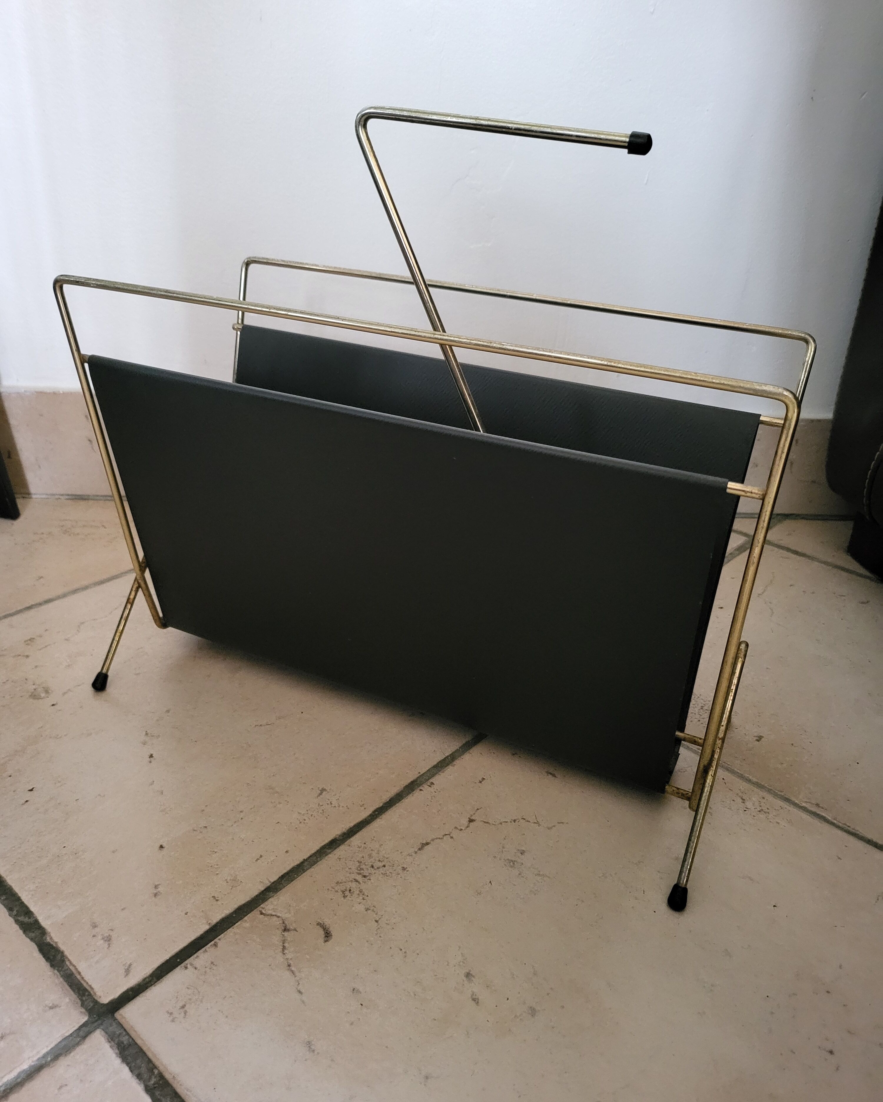 Vintage metal magazine rack in gold and black vinyl Newspaper holder