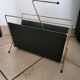Vintage metal magazine rack in gold and black vinyl Newspaper holder