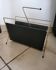 Vintage metal magazine rack in gold and black vinyl Newspaper holder
