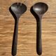 Pair of salad servers or kitchen utensils in blackened teak L30 D9