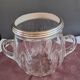 Twisted moulded glass bistro champagne bucket with a silver metal collar.