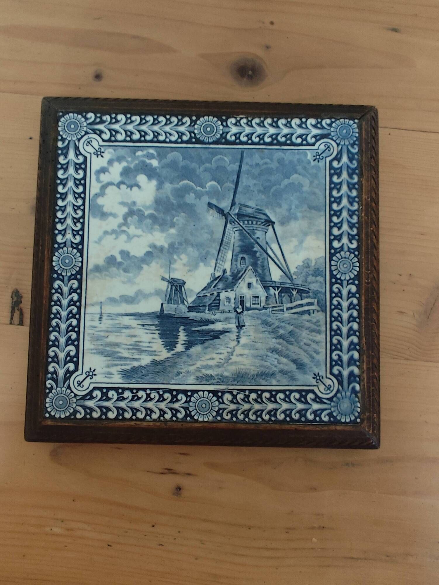 Ceramic tile trivet and wooden frame with Dutch windmill.