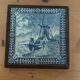 Ceramic tile trivet and wooden frame with Dutch windmill.