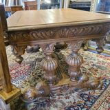 Rebirth table with oak dolphins