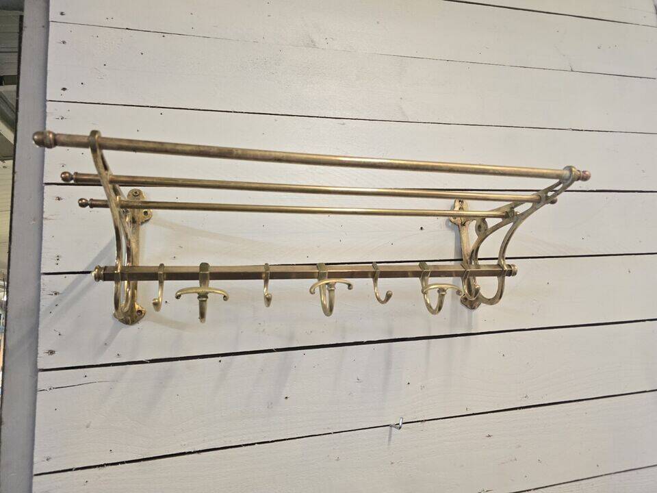 Wall-mounted coat rack with brass hat rack