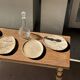Small beige oval petrified wood dish or tray with crystals.