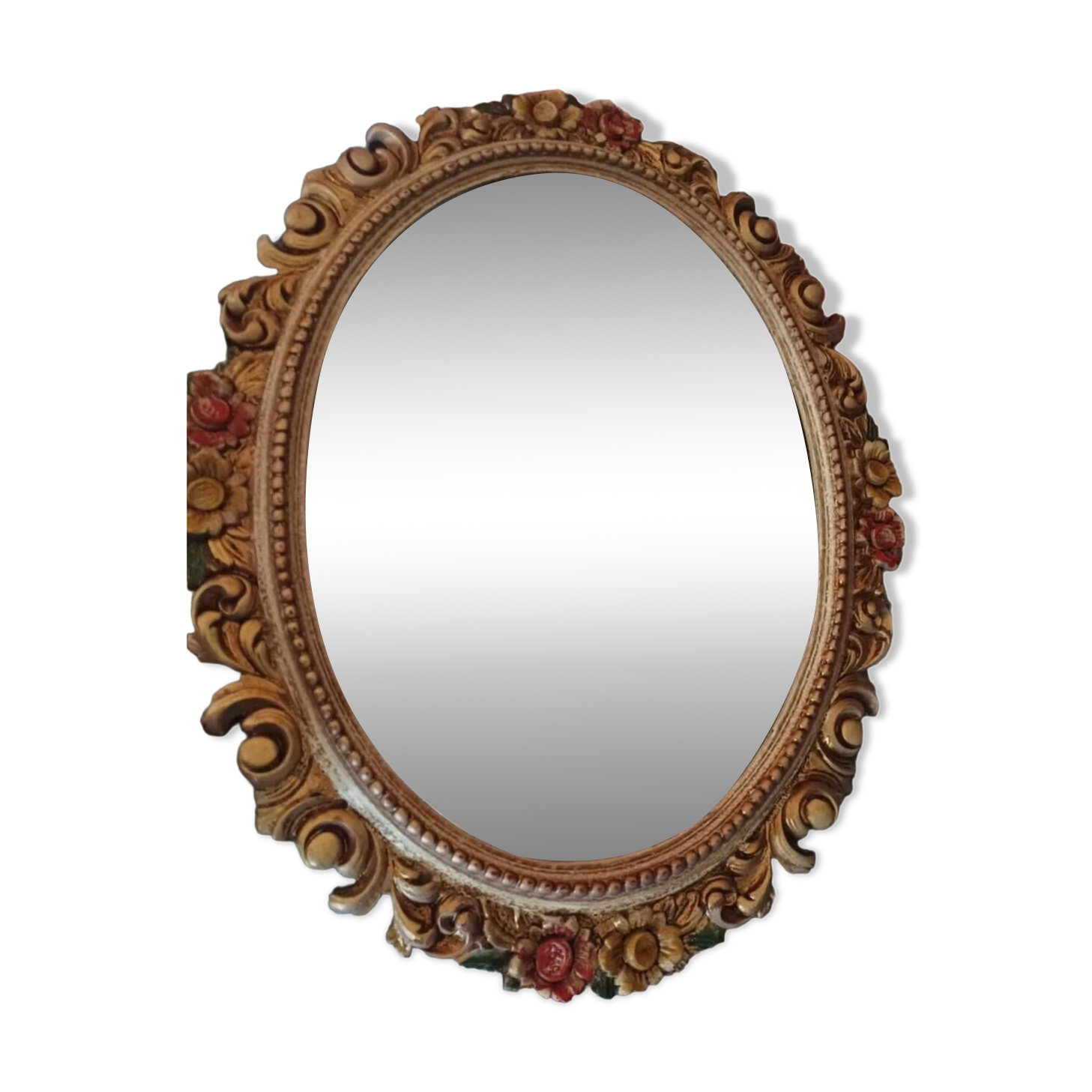 Miroir sculpté en bois et feuille d'or polychrome