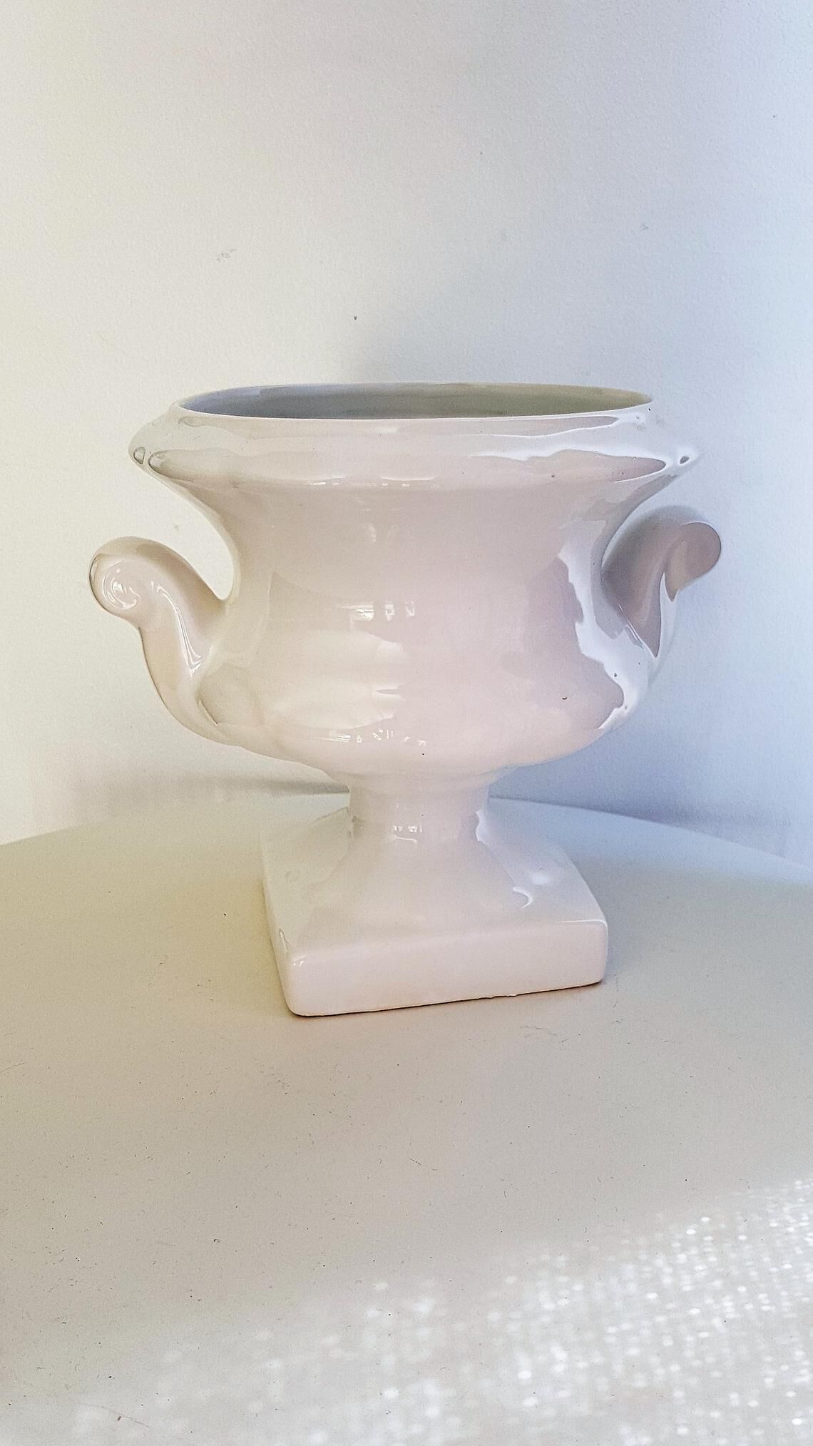 White ceramic medici-shaped planter
