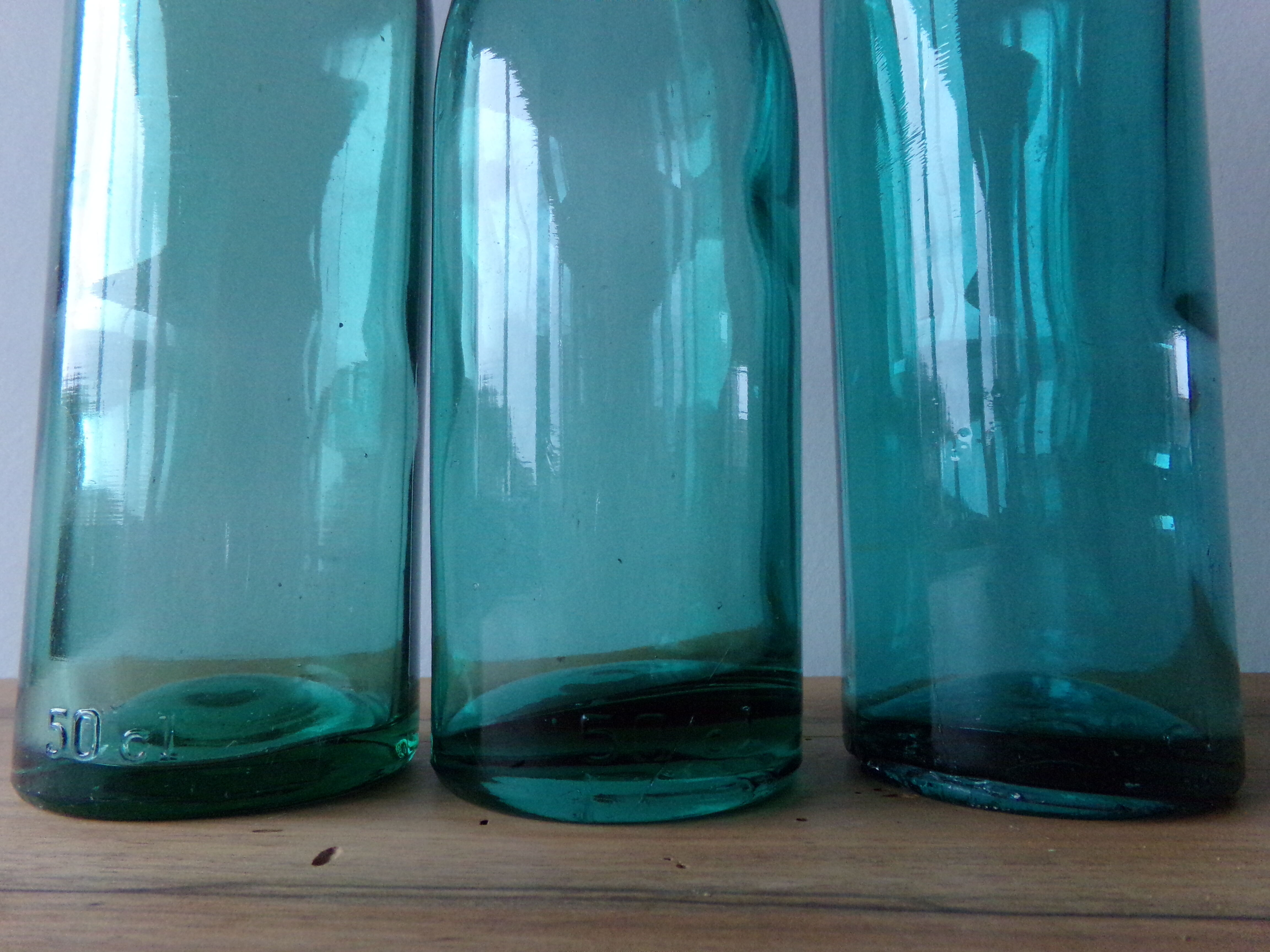 3 old green bottles