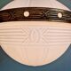 Large Art Deco pendant light in milky glass and brass, 1920