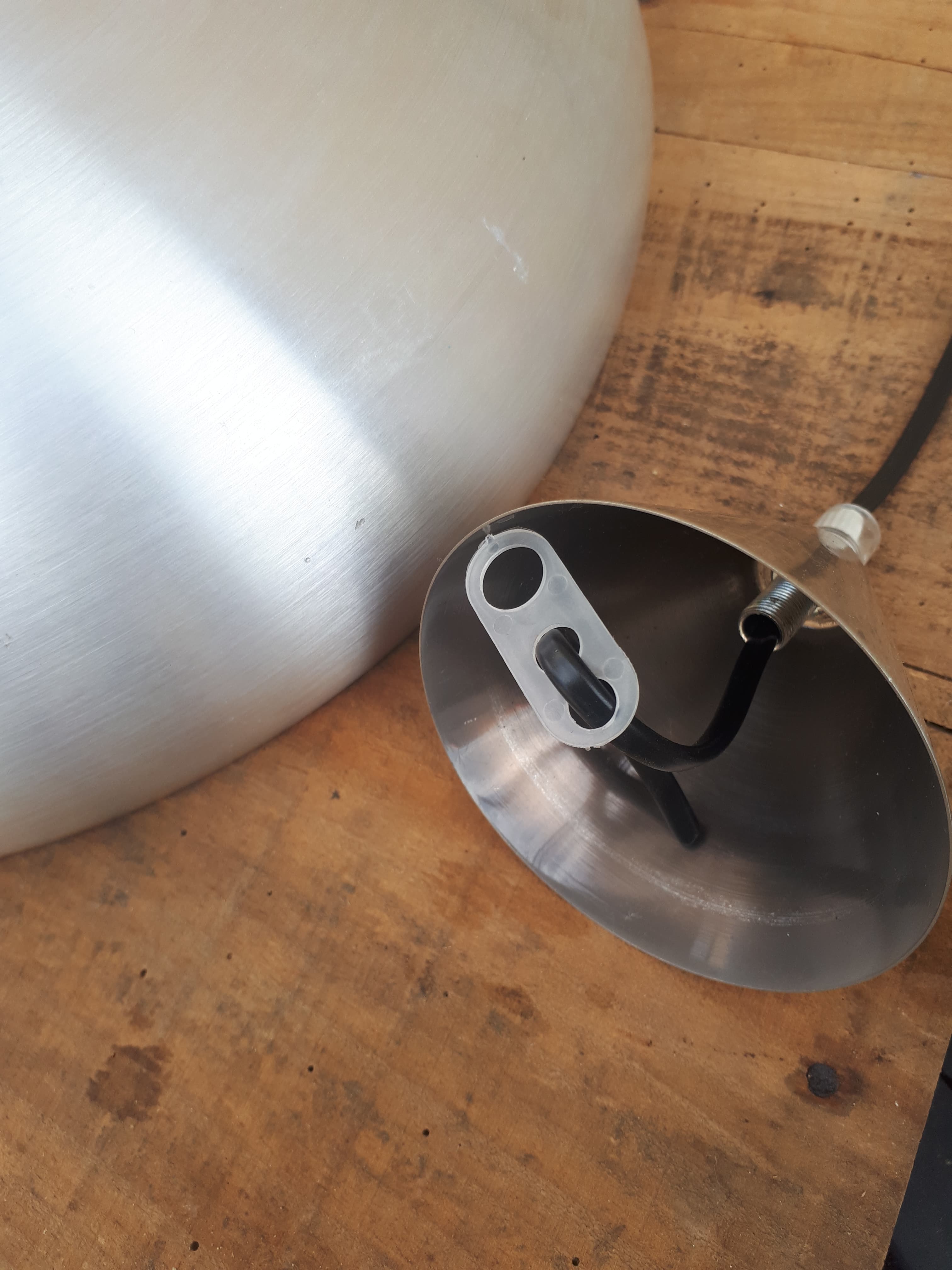 UFO suspension in brushed metal