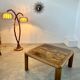 Old coffee table with golden marble top, 70s design, vintage wooden feet