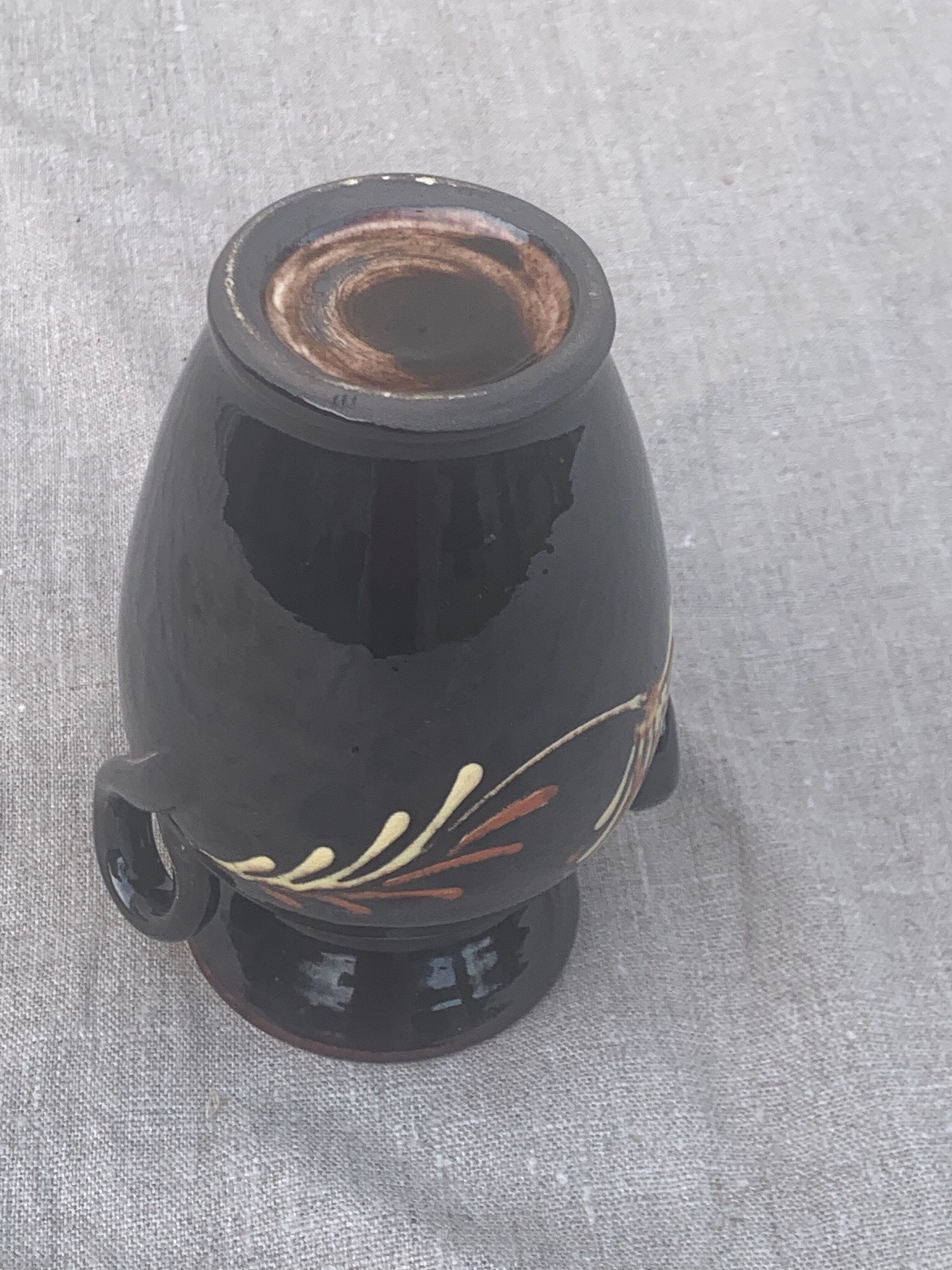 Vintage hand-painted yellow and black glazed ceramic amphora vase