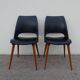 2 chairs in black skai compass legs Louis Paolozzi