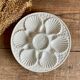 4 assiettes à huîtres en barbotine blanche