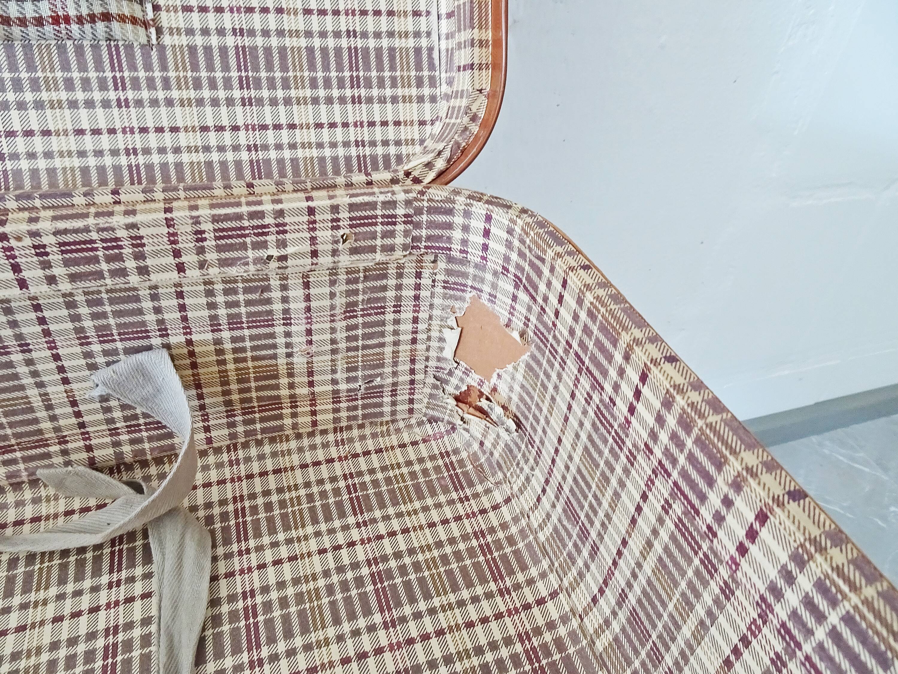 Valise de couleur cognac, valise dure