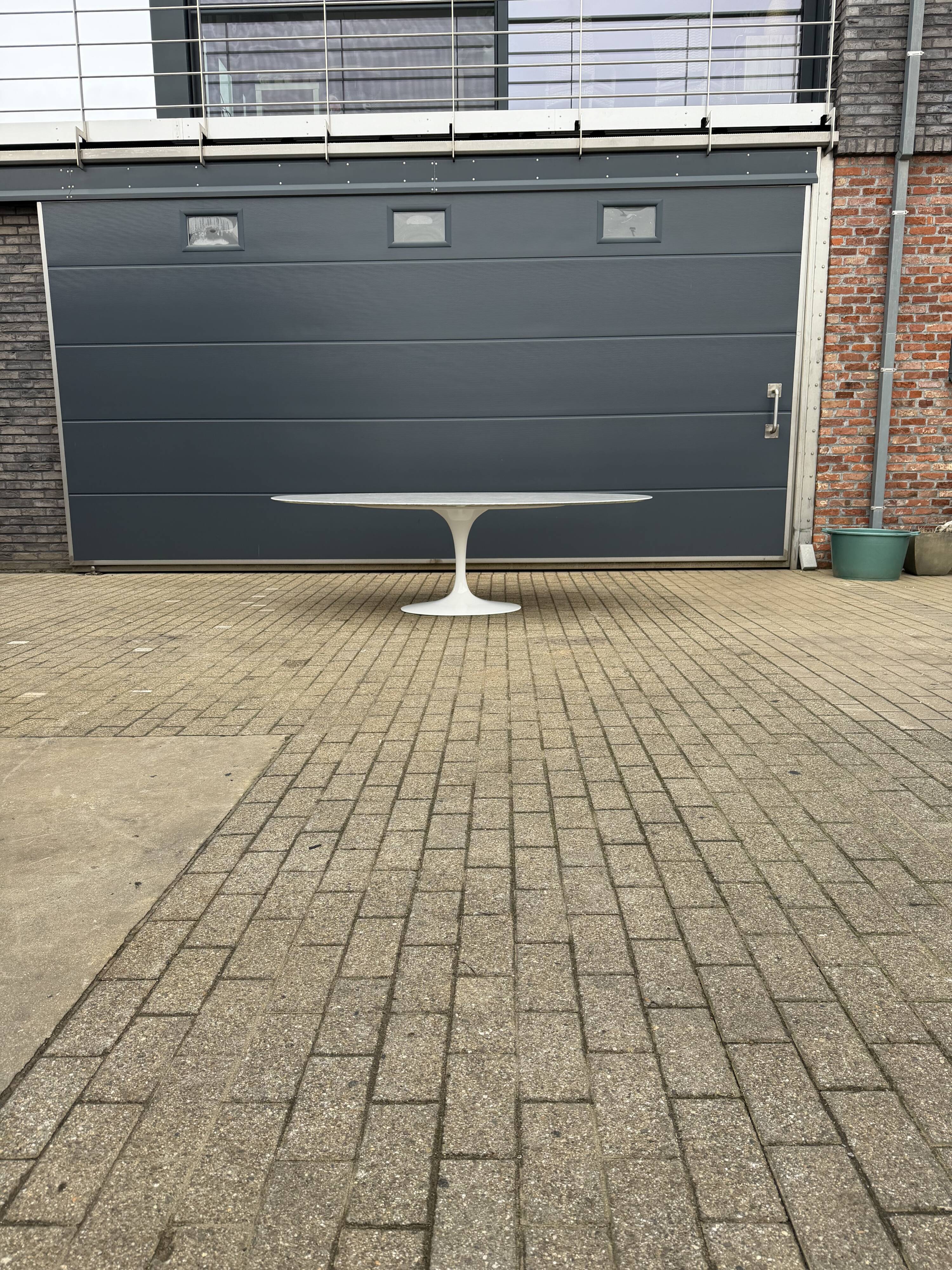 Original Knoll Tulip oval dining table (244cm) in Carrara marble.