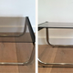 Pair of sofa ends in chrome, blackened wood and glass