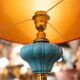 Pair of vintage floor lamps in brass and turquoise ceramic.