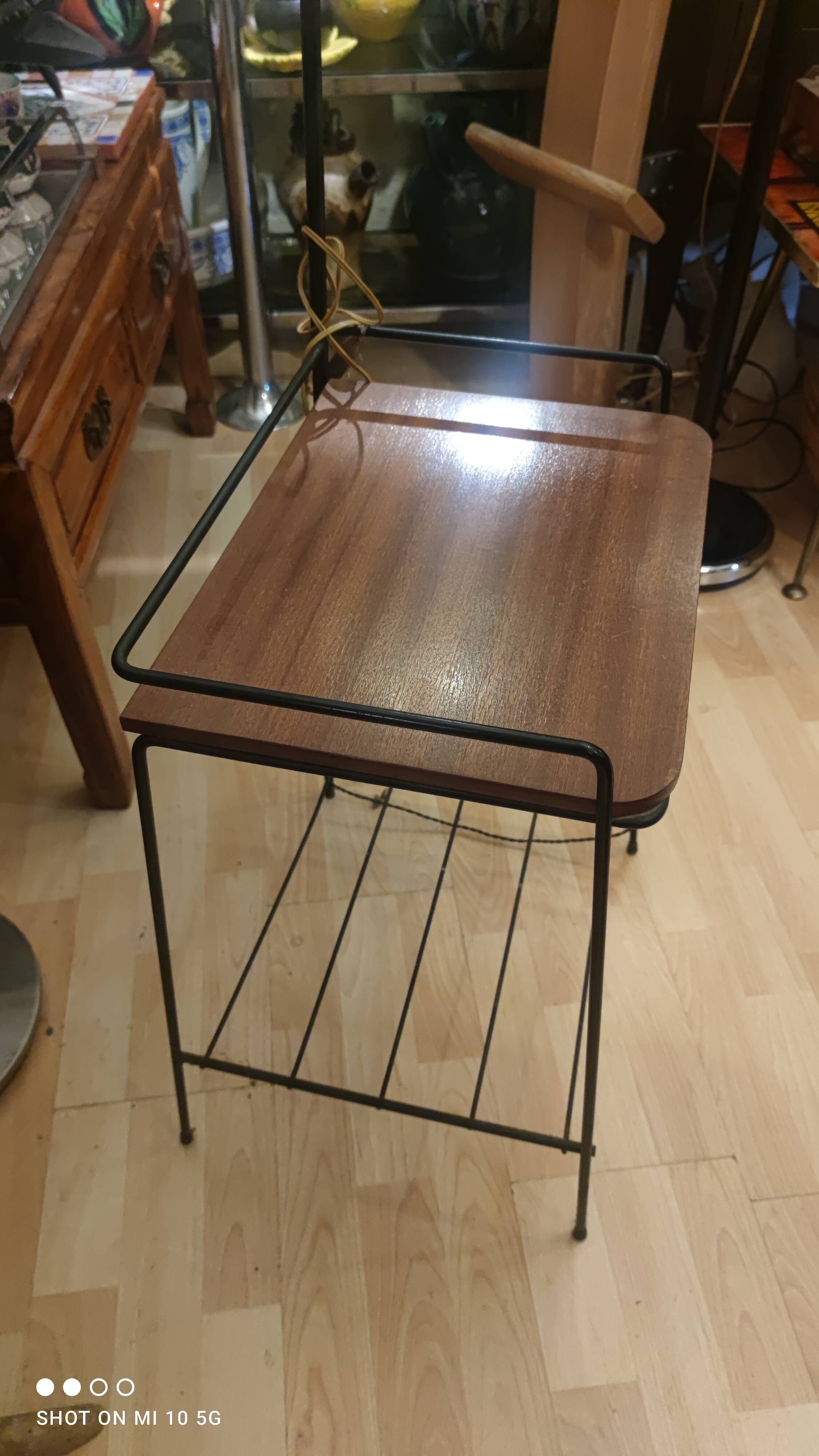 Wrought iron and mahogany floor lamp, circa 1950
