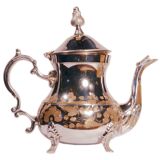 Oriental teapot in chrome metal and brass, 12x19cm
