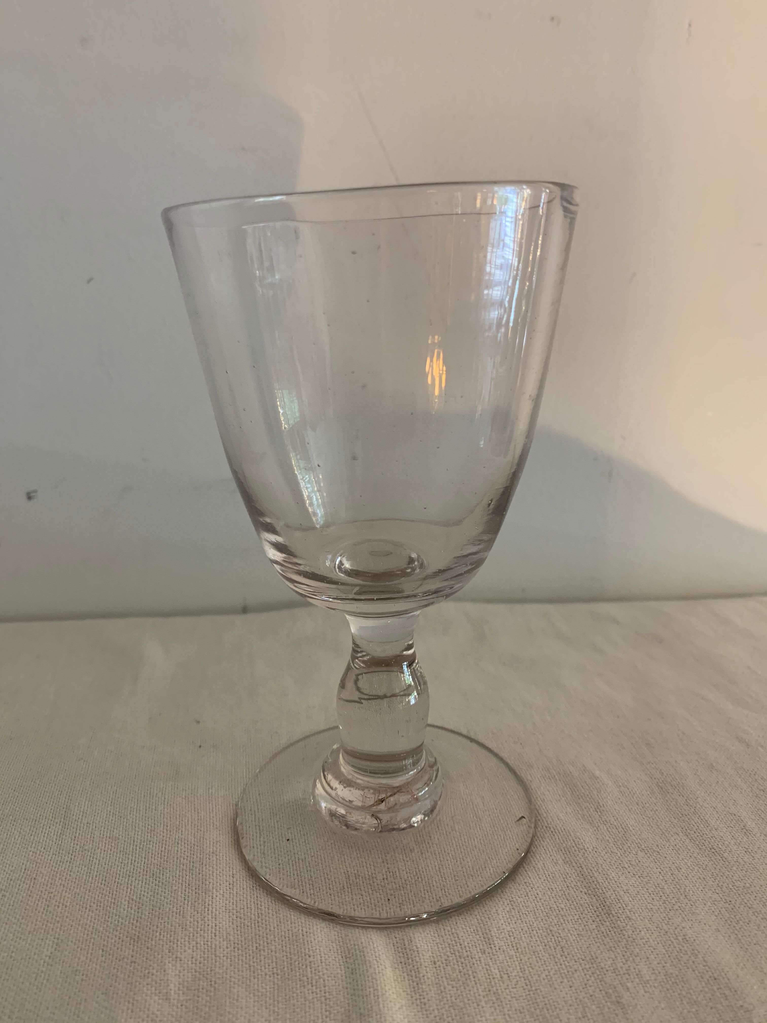 8 old blown and different foot wine glasses