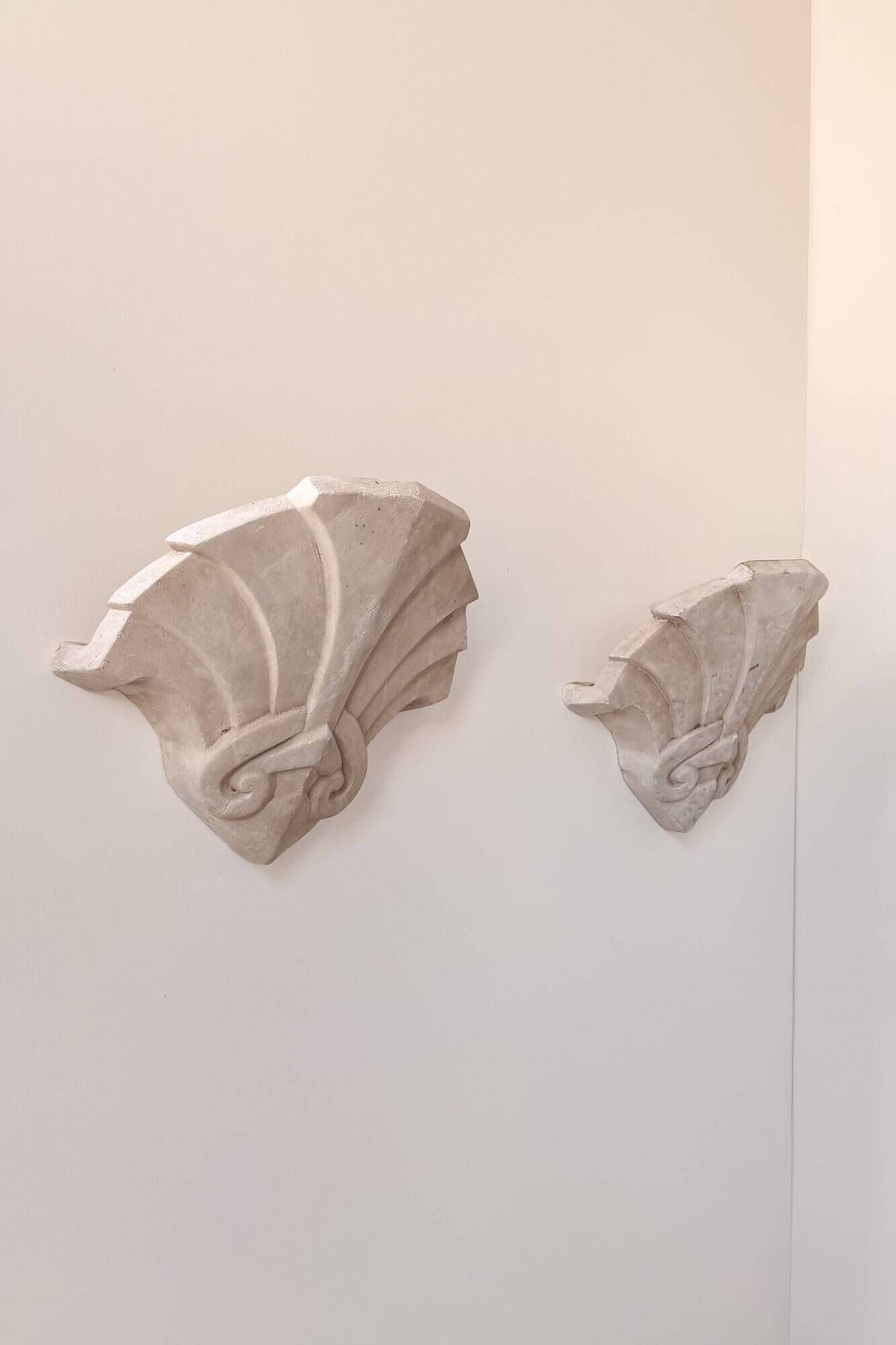 Pair of vintage geometric wall sconces in plaster, France, 1960.
