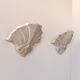 Pair of vintage geometric wall sconces in plaster, France, 1960.