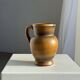 Speckled stoneware jug with grape pattern H17