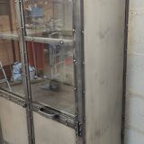 Riveted metal display cabinet library