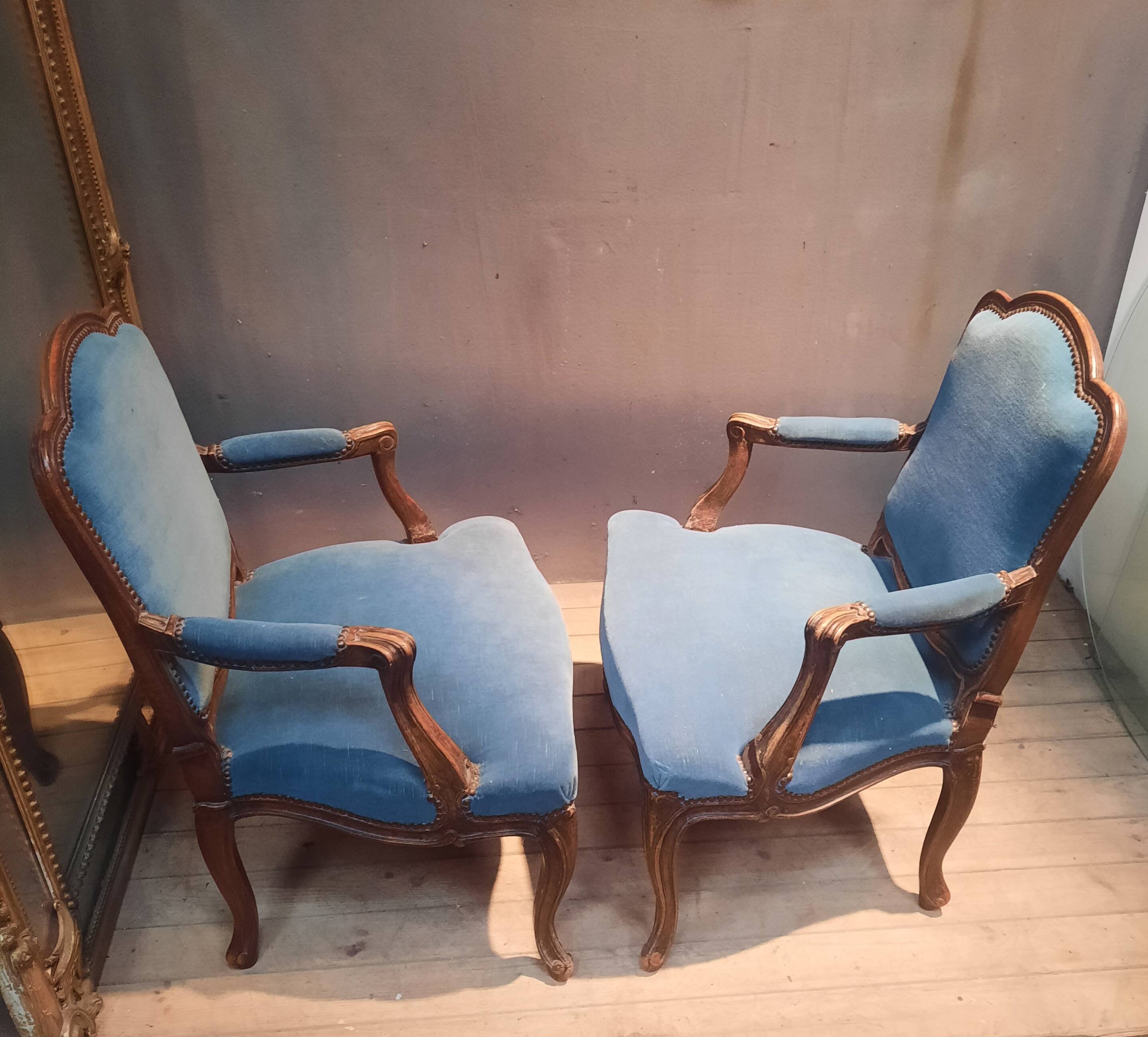 Pair of large armchairs in Louis XV style from the 19th century.