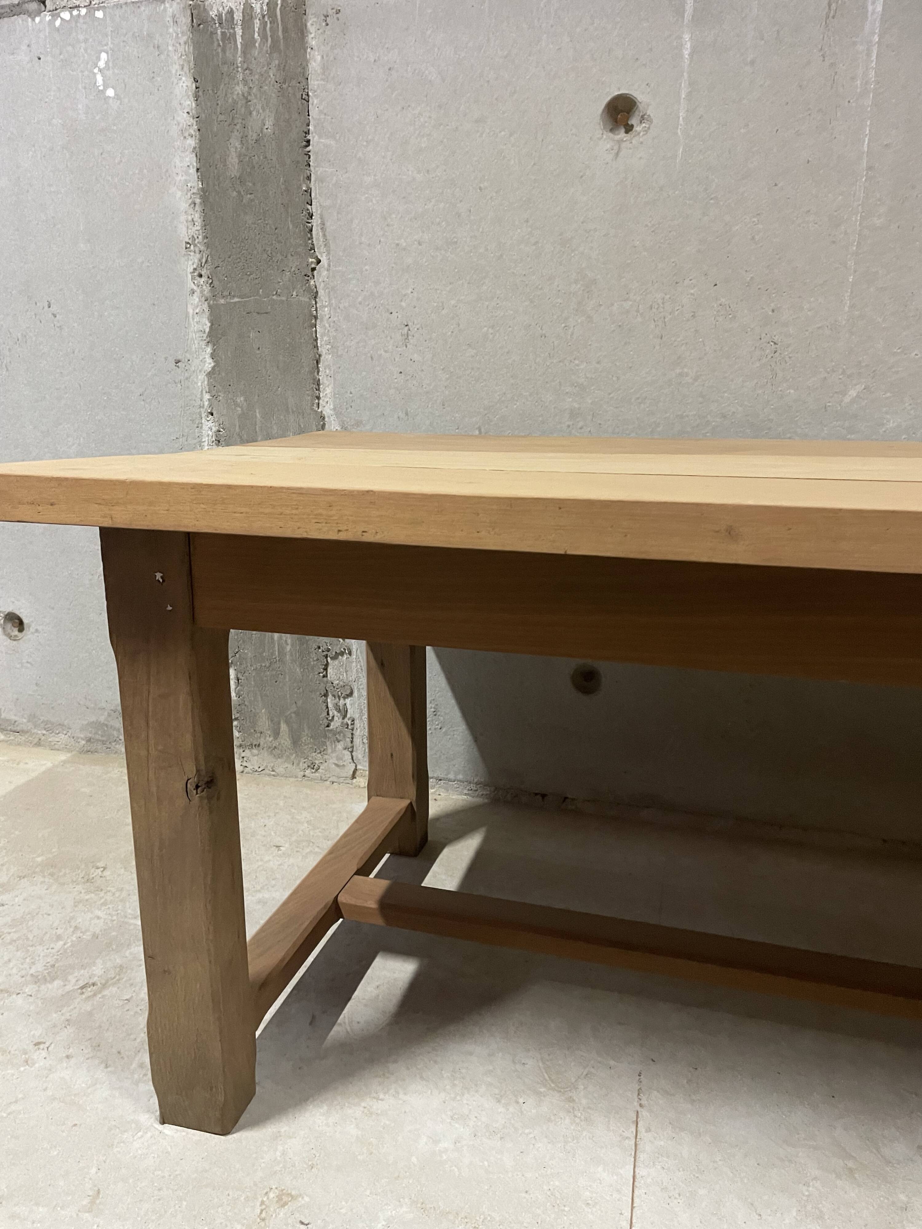 Large convivial solid wood table – ideal for big gatherings.