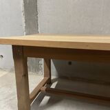 Large convivial solid wood table – ideal for big gatherings.