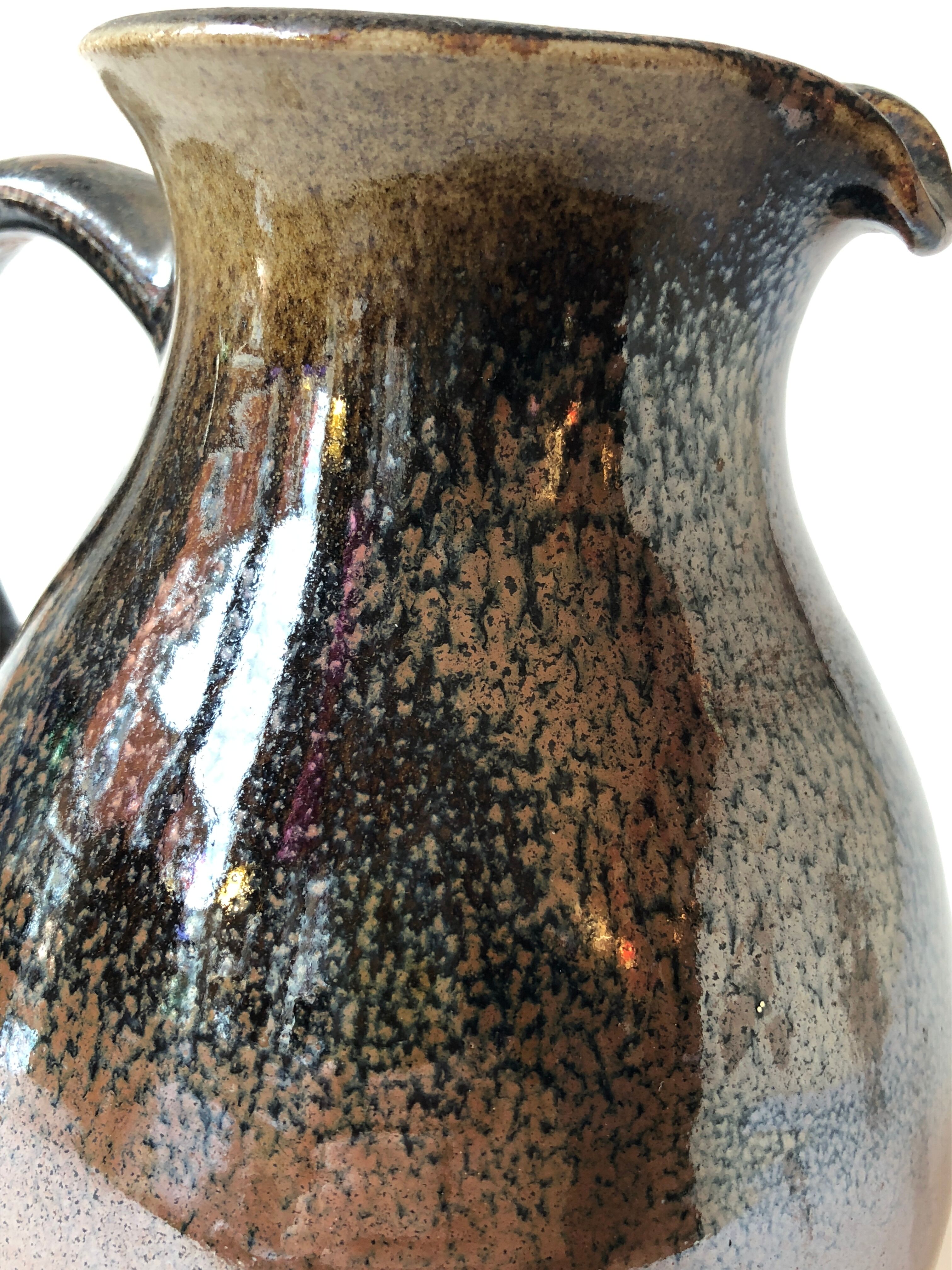 Glazed stoneware jug signed "KD".