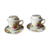 Two cups with herbal tea from the Faiencerie of Pillivuyt