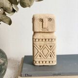 minimalist stone faces