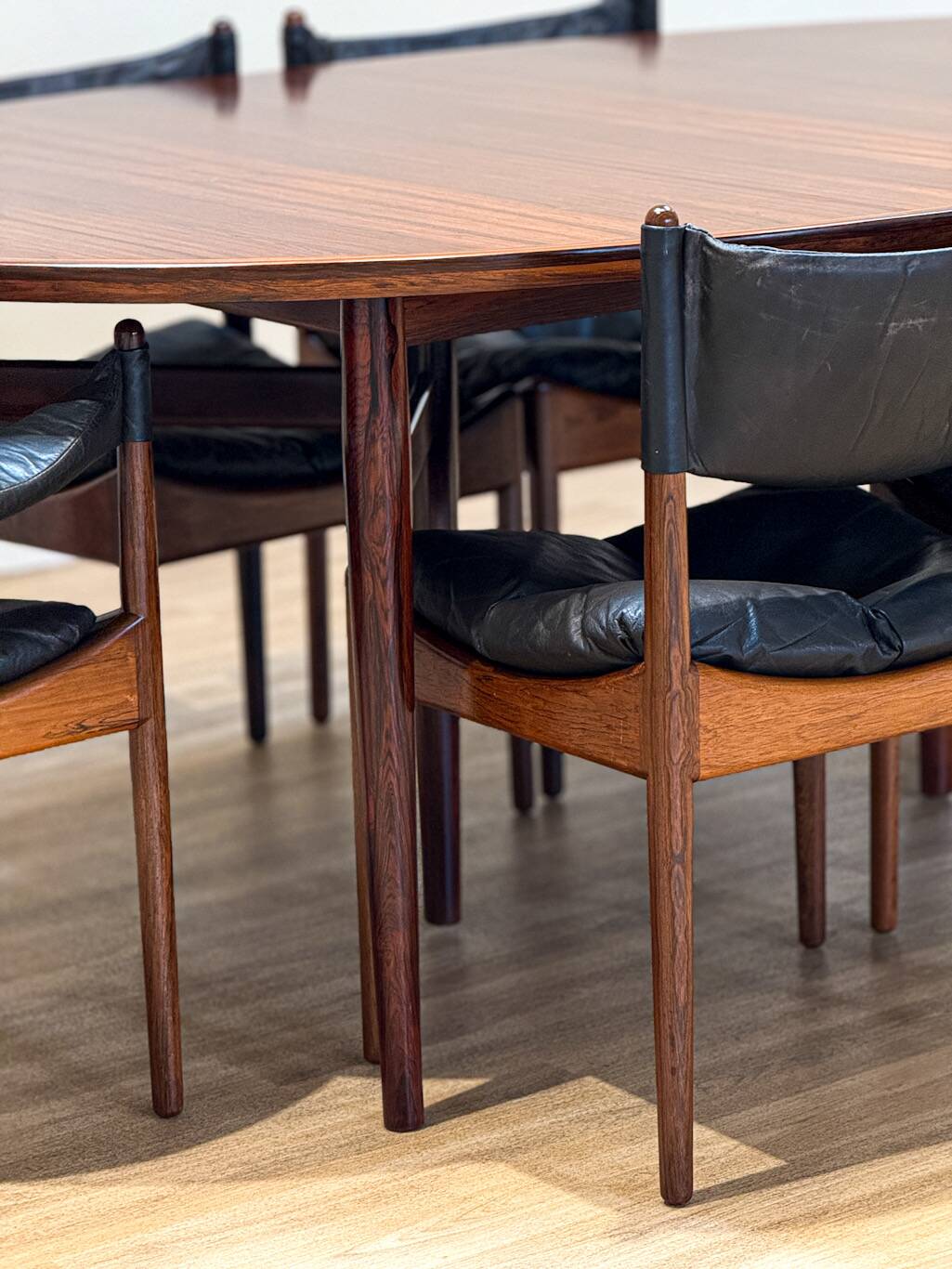 Extendable dining room table and chairs (by Kristian Solmer Vedel)