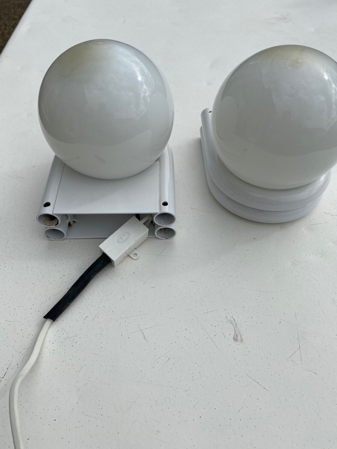 Pair of white and opaline metal wall lights