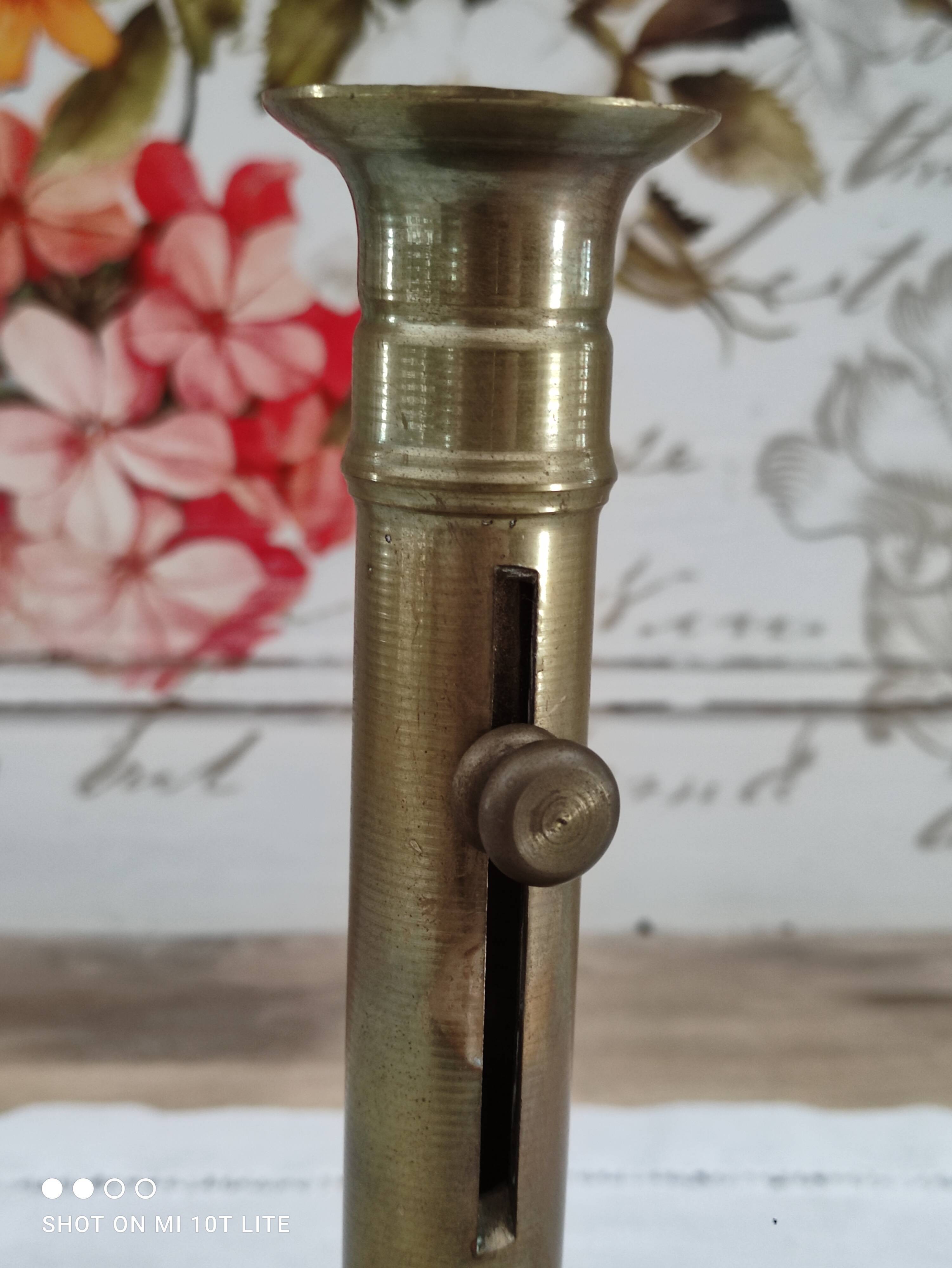 Pusher candle holder on solid brass frame