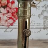Pusher candle holder on solid brass frame