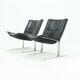 Set of 2 Danish lounge chairs by Kebe Møbler model Eagle with black leather.