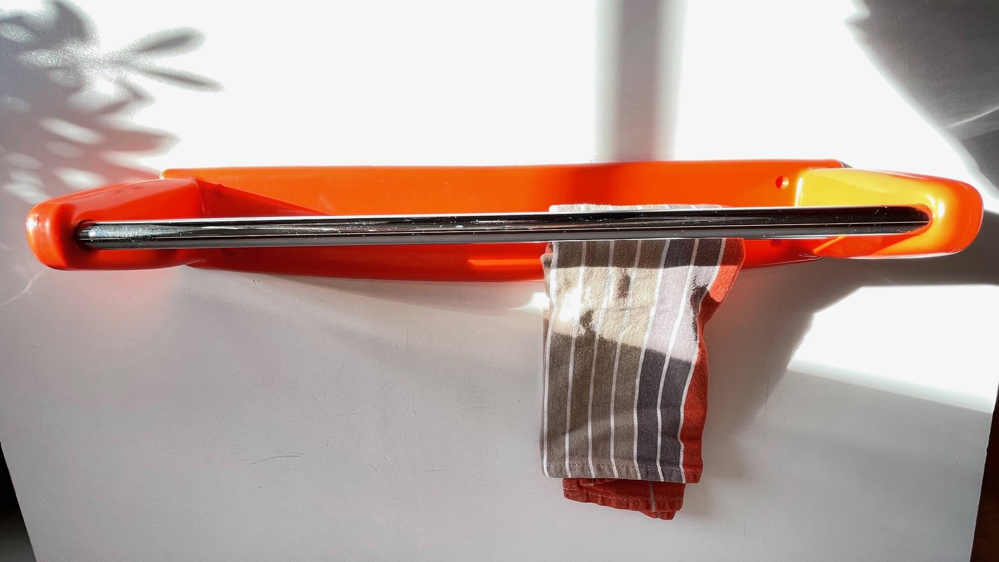 Orange towel rack by Syla from the 70s